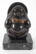 20th century School, figure of a rotund lady in a bikini and hat, bronze on a marble base,