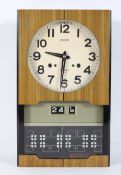 A Seiko 30 day wall clock,