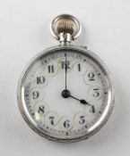 An open face pocket watch. Circular white dial (cracked) with numerical markings.