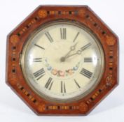 A Swiss wall clock, the 8 1/2" painted dial on a 30 hour movement,