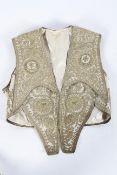 An Indian silk and gilt thread waistcoat,