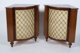 A pair of Decca Decola walnut cased stereo corner speakers, with six speakers behind a gilt grille,