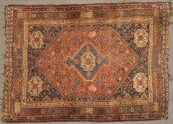 A Kashgai rug, South West Iran, lozenge field with an indigo medallion,