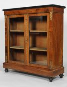 A Victorian walnut and inlaid two door cabinet, with a pair of glazed doors,