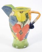 Paul Jackson, a terracotta jug with geometric floral decoration, signed and dated 1993 to base,