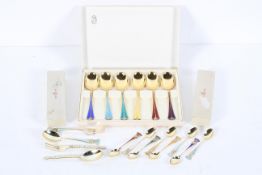 A collection of Norwegian 925 silver gilt spoons and forks, in three boxes,