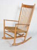 An original Hans Wegner J16 for FDB, Danish 20th century vintage beech wood and cord rocking chair,