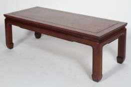 A Chinese hardwood low table, late 19th/early 20th century,