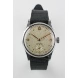 A stainless steel cased Longines manual wind wristwatch with fabric thread through strap.