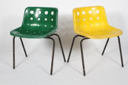 A pair of 20th century retro Robin Day polo chairs by Hille, one yellow, the other green,