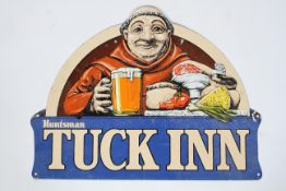 Huntsman Tuck Inn, an enamel advertising sign,