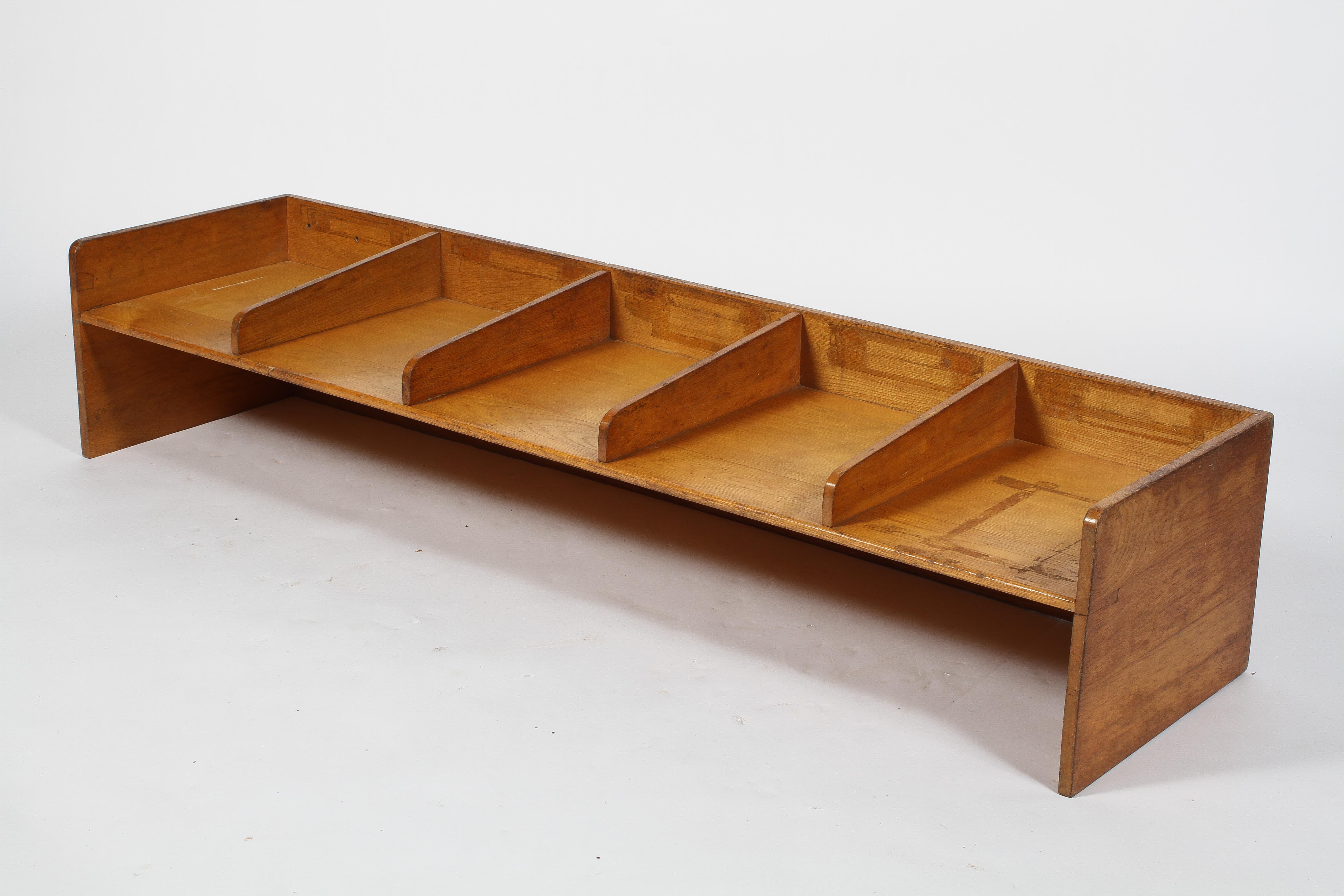 A golden oak sorting rack, with five sections, probably Royal Mail or military, stamped date 1962,