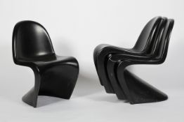 Four black fibreglass chairs, After Verner Panton,