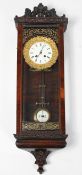 A Swiss 'rosewood' wall clock, the 4" enamelled dial in a gilt frame on a brass movement,
