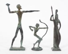 Three Etruscan style patinated bronze figures, including a javelin thrower,