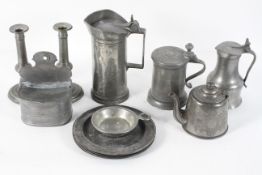 A collection of pewter, 18th century and later, to include tappit hens,