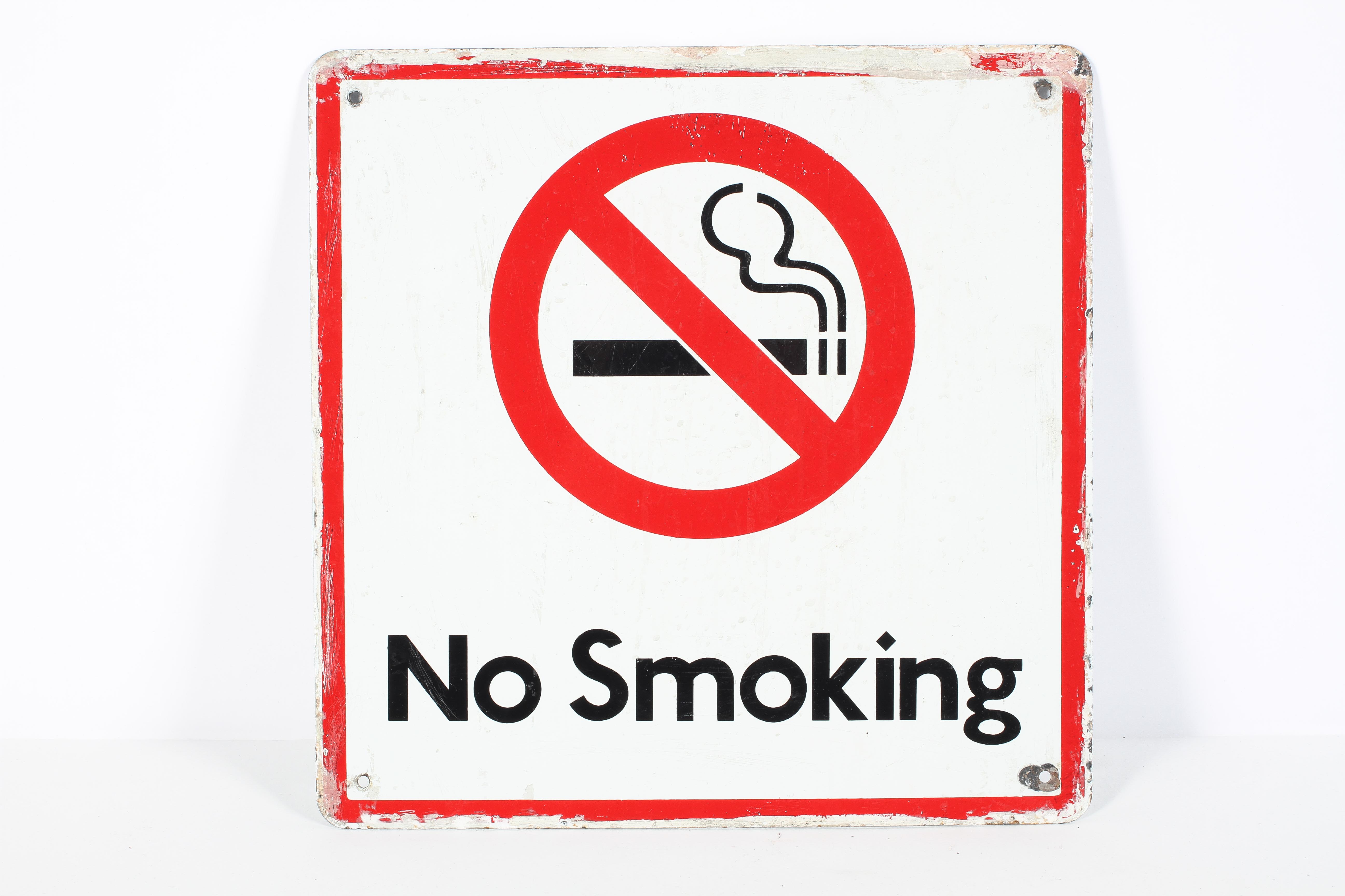 An enamelled 'No Smoking' sign, pierced for hanging, of square section,