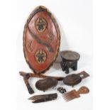 African Tribal Art : A collection, to include a shield, stool, ashanti head, axe, two knives,