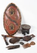 African Tribal Art : A collection, to include a shield, stool, ashanti head, axe, two knives,