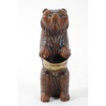 A Black Forest Bear bottle cap holder,