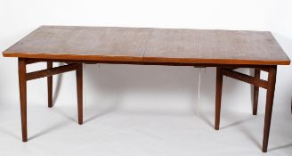 An Arne Vodder for Sibast Mobler teak extending dining table, of bowed rectangular form,