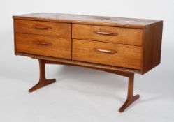 A 1960's retro vintage Austinsuite teak wood four drawers sideboard with lipped handles to each,