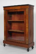 A mahogany and hardwood inlaid pier cabinet, 19th century, with glazed door and gilt metal mounts,