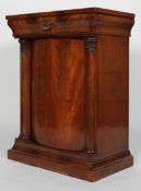 An Empire style mahogany pier cabinet,