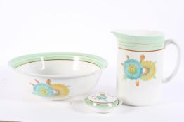 A Wilkinson wash set, painted in a Clarice Cliff 'Rhodanthe' style design, comprising an ewer,