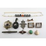 A collection of costume jewellery of variable designs to include six brooches,