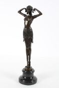 After D H Chiparus, An Art Deco female dancer, bronze on a black marble base,