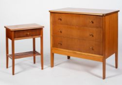 A mid-century teak chest of drawers, with three long drawers, on canted legs,