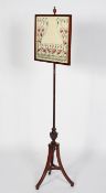 A Victorian mahogany adjustable fire screen,