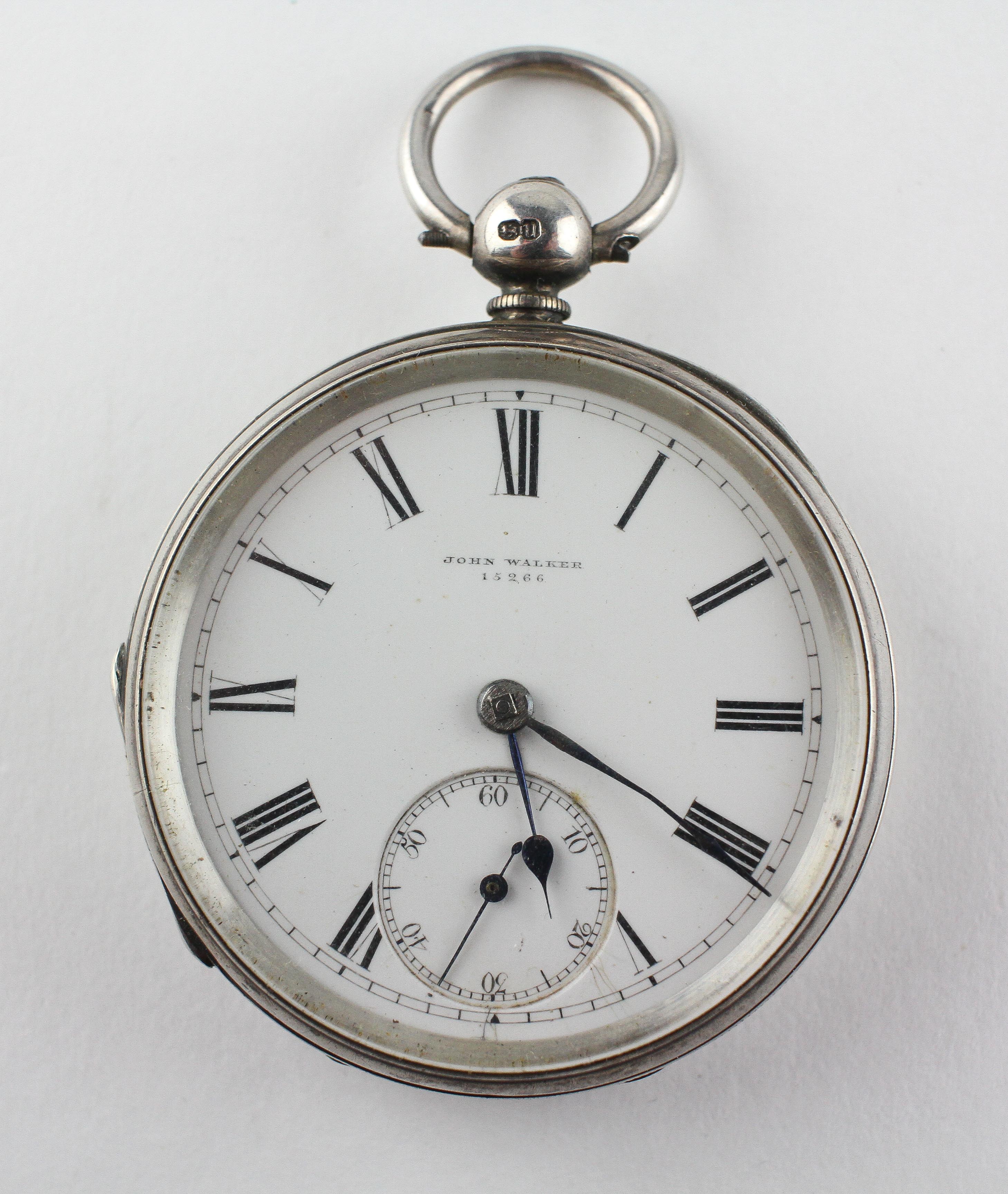 An open face pocket watch.