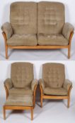 An Ercol Saville sofa suite, comprising a two seat sofa, two armchairs and a foot stool,