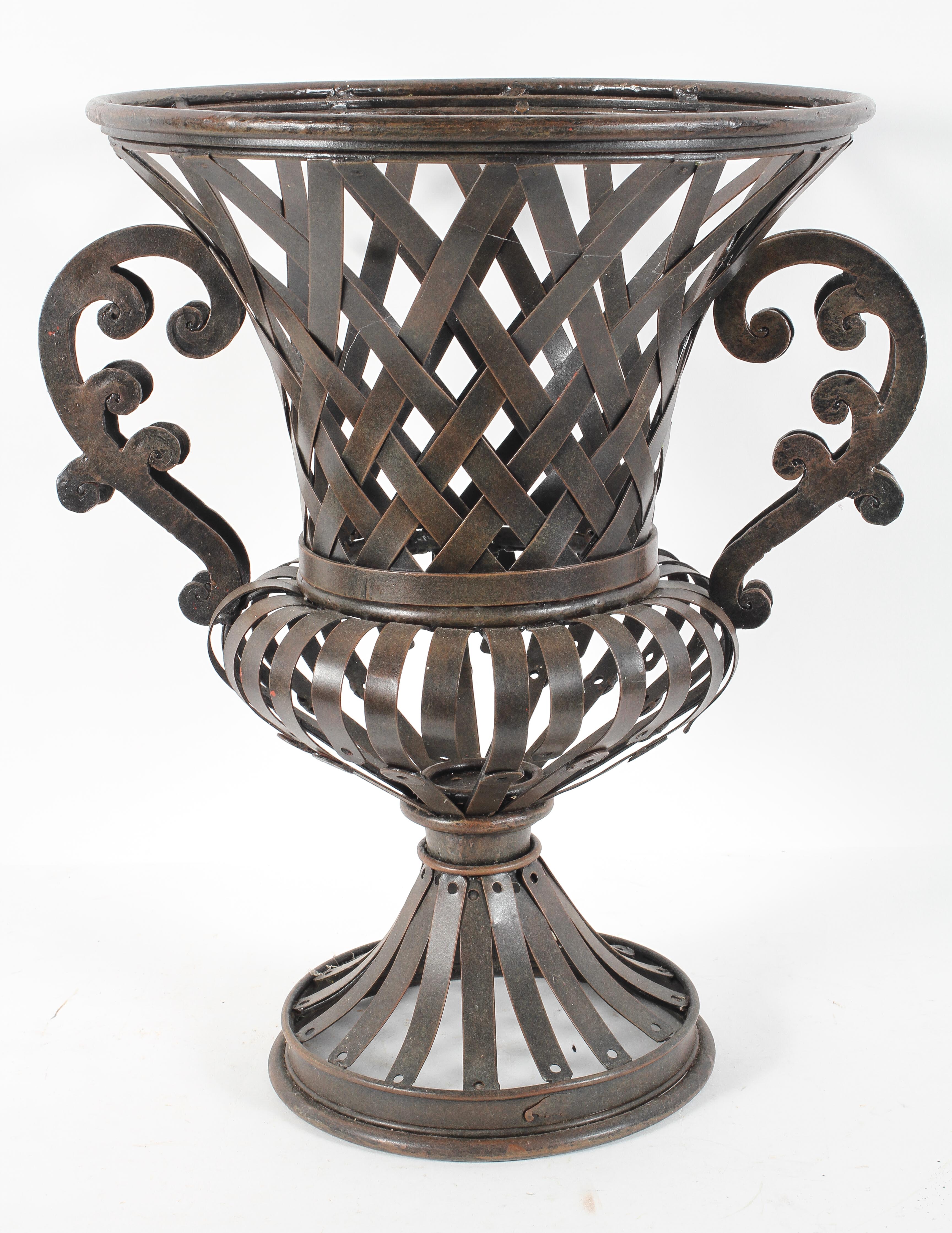 A bronzed metal jardiniere, of campana urn form,