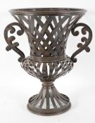 A bronzed metal jardiniere, of campana urn form,