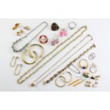 A collection of costume jewellery to include two rings, two necklaces, thirteen pairs of earrings,