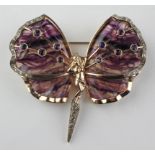 A large yellow and rose metal butterfly brooch