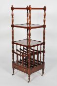 A Victorian style mahogany whatnot canterbury, with three shelves above the magazine rack,