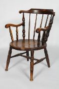 A 19th century ash and elm Windsor chair, with turned spindles, scroll arms,