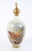 A Royal Worcester vase and cover, date code for 1923, shape H294, signed H Stinton,