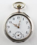 An open face pocket watch.