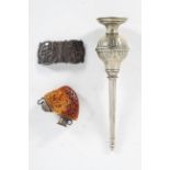 A Middle Eastern white metal rosewater sprinkler, with foliate decoration,