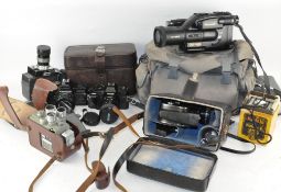 A collection of vintage cameras.