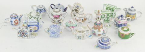 A collection of miniature teapots, by 'Porcelain Art',