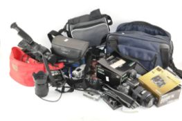 A collection of cameras and equipment,