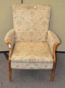 An upholsted Parker Knoll armchair,