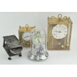 A collection of clocks, mostly anniversary clocks, together with a Gramaphone movement,