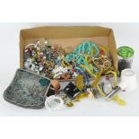 An assortment of vintage costume jewelley